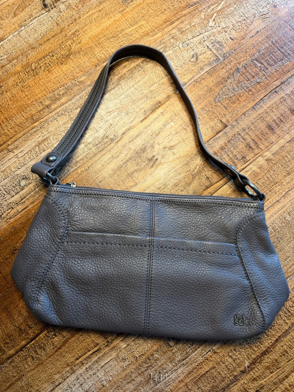 The SAK gray pebbled leather purse / bag in gray mint condition no flaws
